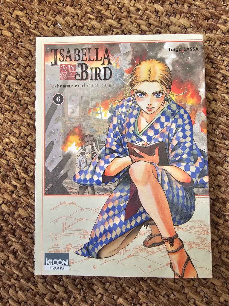 Couverture du manga 'Isabella Bird', illustrant une femme habillée de manière traditionnelle, avec un regard déterminé dans un cadre historique.